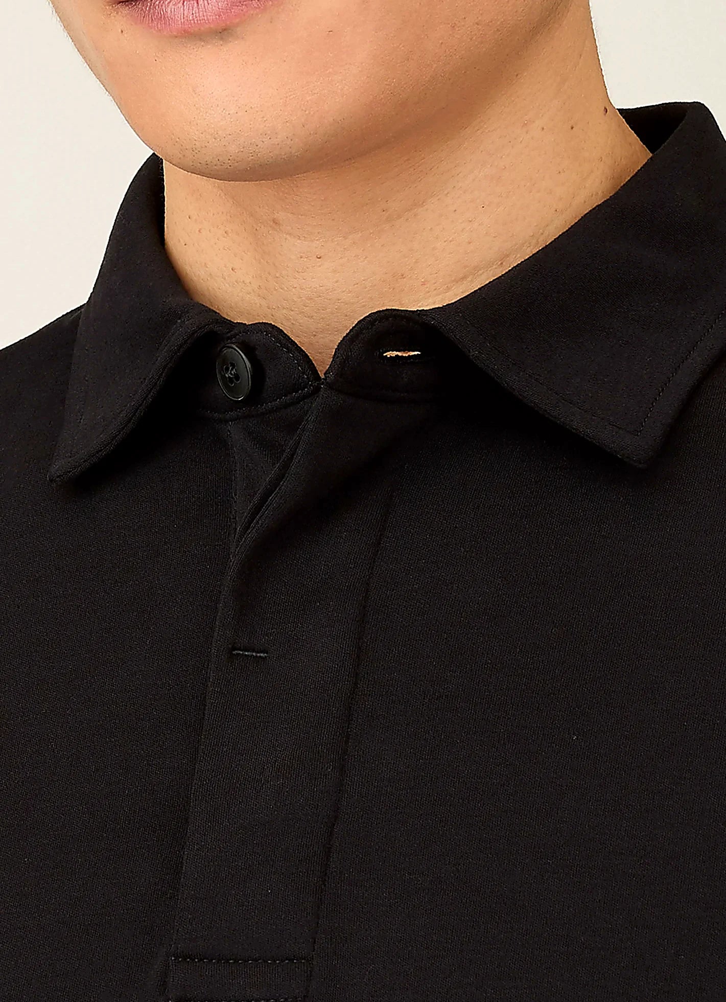 Black rugby polo shirt for a men's wardrobe